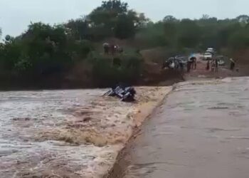 Honda Fit swept away while attempting to cross flooded river