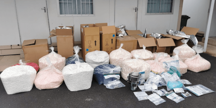Two cops arrested for clandestine drug laboratory