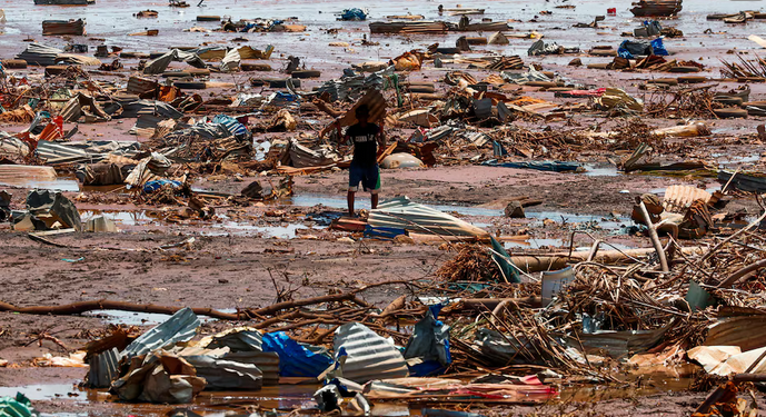 Macron swears in angry exchange with residents of cyclone-hit Mayotte